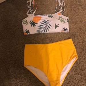 A bathing suit. With pineapples on it